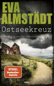 Cover_Ostseekreuz_Thumb300_zeigt Küstenweg mit dunklen Wolken am Himmel
