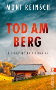 Cover_Tod am Berg_Thumb300_zeigt einsame Almhütte, im Hintergrund Bergmassiv im Nebel