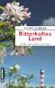 Cover_Bitterkaltes Land_Thumb_zeigt Apfelblüte und im Hintergrund einen Leuchtturm