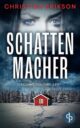 Cover_Schattenmacher_Medium_zeigt typische verschneite schwedische Landschaft mit einem roten Schwedenhaus, darüber das Gesicht einer Frau, sehr geheimnisvoll